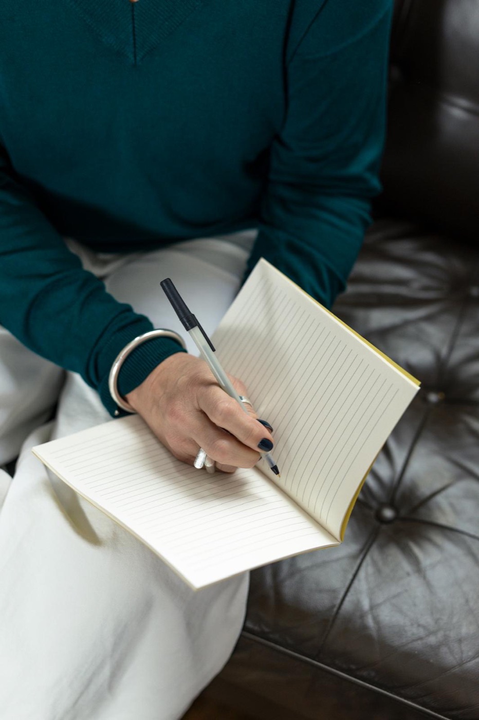 Making notes in a journal during an occupational therapy session